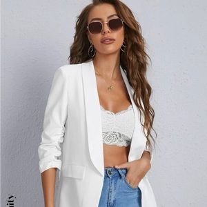 Never worn!! Perfect condition, size medium but fits like a large.